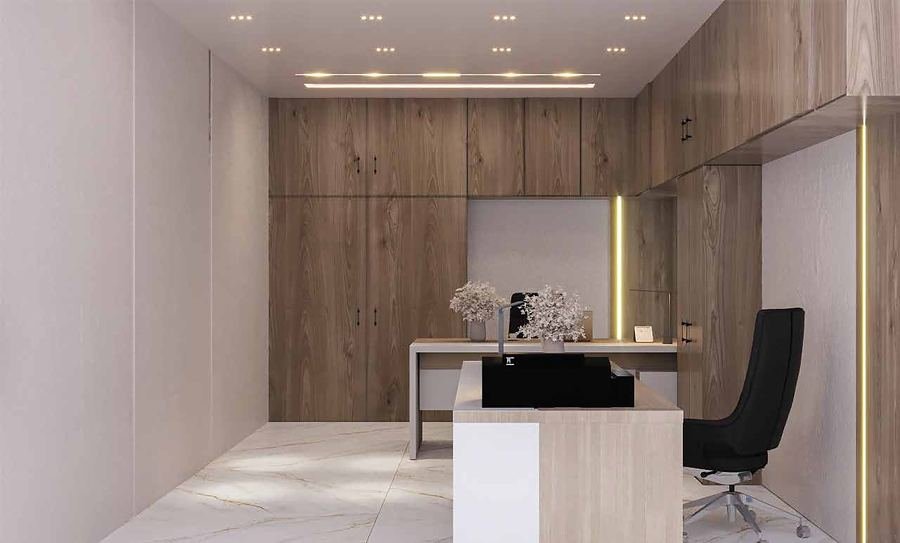 Finished manager's office with oak wall panelling, a turnkey fit-out by Designation in Dammam